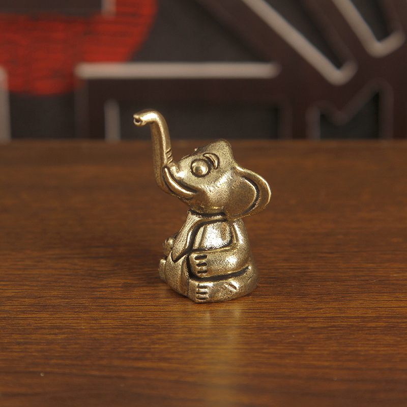 قطعة واحدة من التميمة النحاسية - مراجعة Art Craft Elephant وسعره